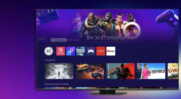 Ekran telewizora vidaa z grami w chmurze. Widoczne ikony aplikacji, gry "Metro Exodus", "Hot Wheels Unleashed" i "Tennis 2 World Tour".