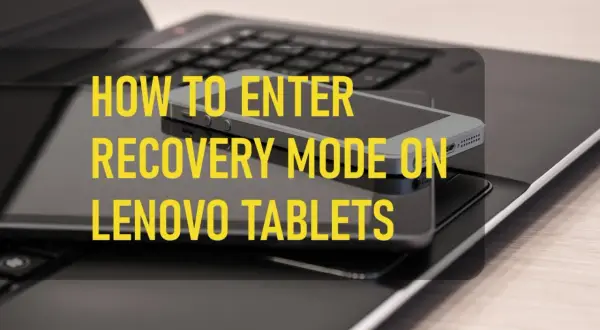 Jak zresetować tablet Lenovo? Na zdjęciu widać tablet i smartfon na klawiaturze laptopa, z tekstem "HOW TO ENTER RECOVERY MODE ON LENOVO TABLETS".