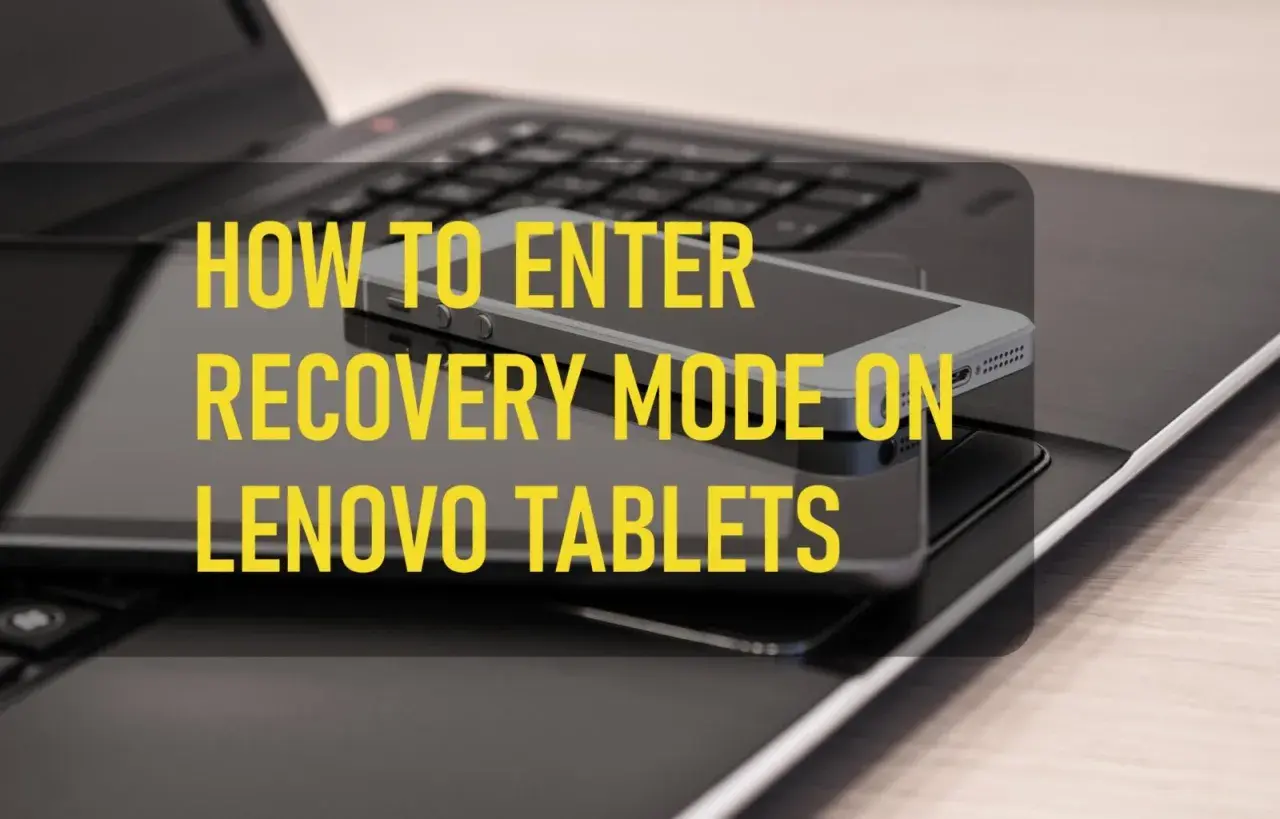 Jak zresetować tablet Lenovo? Na zdjęciu widać tablet i smartfon na klawiaturze laptopa, z tekstem "HOW TO ENTER RECOVERY MODE ON LENOVO TABLETS".